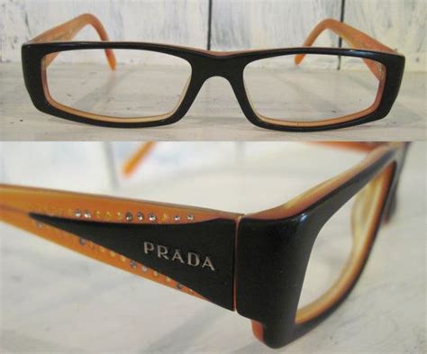 prada made|Prada made in Italy glasses.